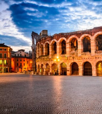 The amphitheatre, completed in 30AD, the third largest in the world, at dusk time. Piazza Bra and Roman Arena in Verona, Italy